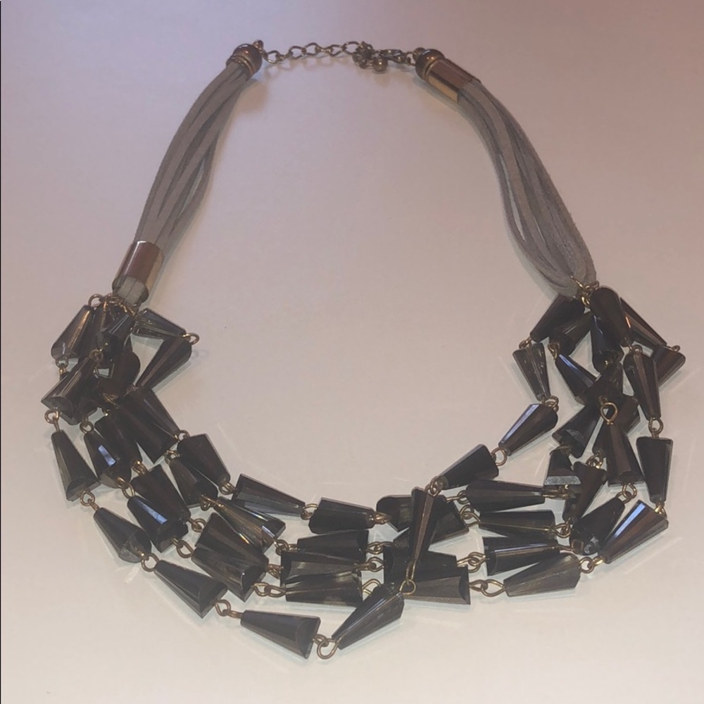 Grey and gunmetal necklace with gold accents